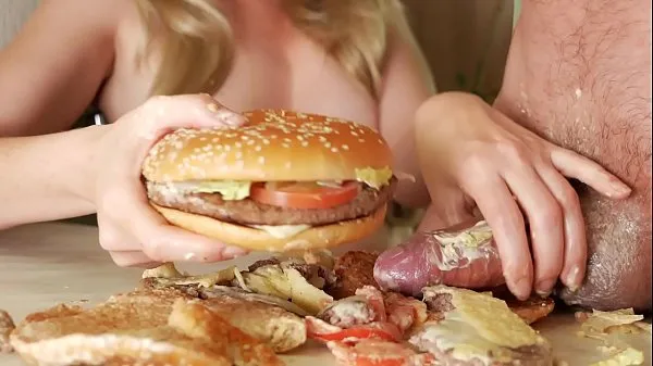 Nye fuck burger. the girl jerks off the guy's dick with a burger. Sperm pouring onto the steak. really favorite burger friske film